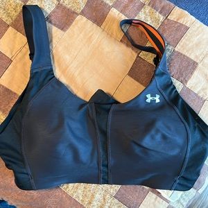 Black and orange Under Armor sports bra